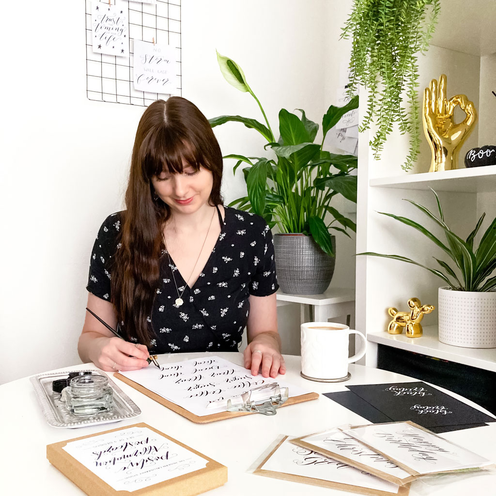 Lizzie sat down writing in her studio