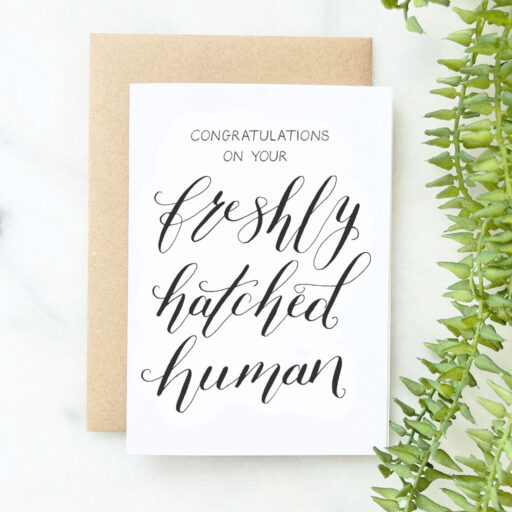 Freshly Hatched Human Card Front Flatlay
