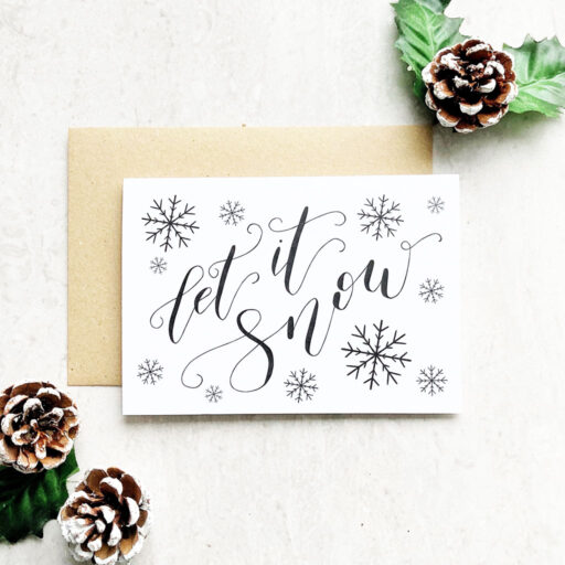 LET-IT-SNOW-CHRISTMAS-CARD-SNOWFLAKES-ILLUSTRATION-FLATLAY