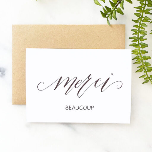 MERCI-BEAUCOUP-CARD-FLAT-LAY-FRONT